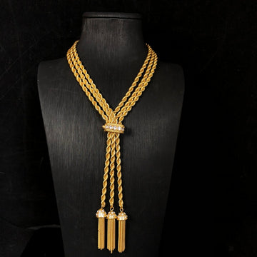 Hong Kong-style, personalized, trendy, minimalist jewelry with diamond accents, featuring a geometric double-layer twisted chain design, a simple gold finish, and a fashionable tassel