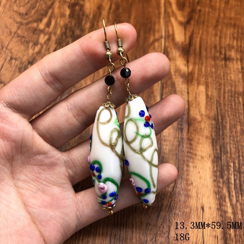vintageVintage-style copper-inlaid glass horse-eye design earrings, a fashionable and versatile set