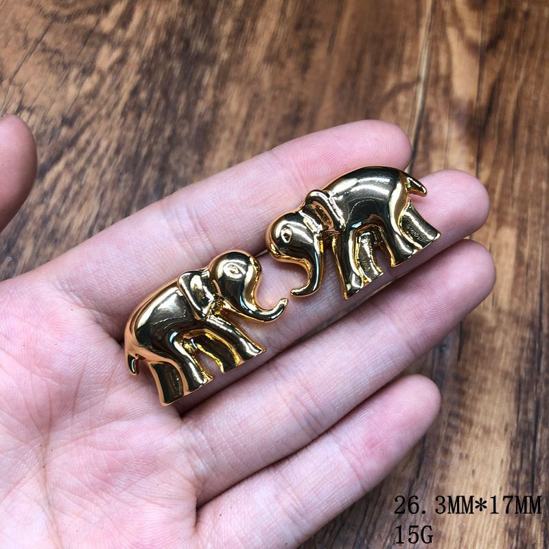 New stylish and versatile design, featuring a simple gold-tone aesthetic, and a fashionable elephant-themed necklace, bracelet, and earring set