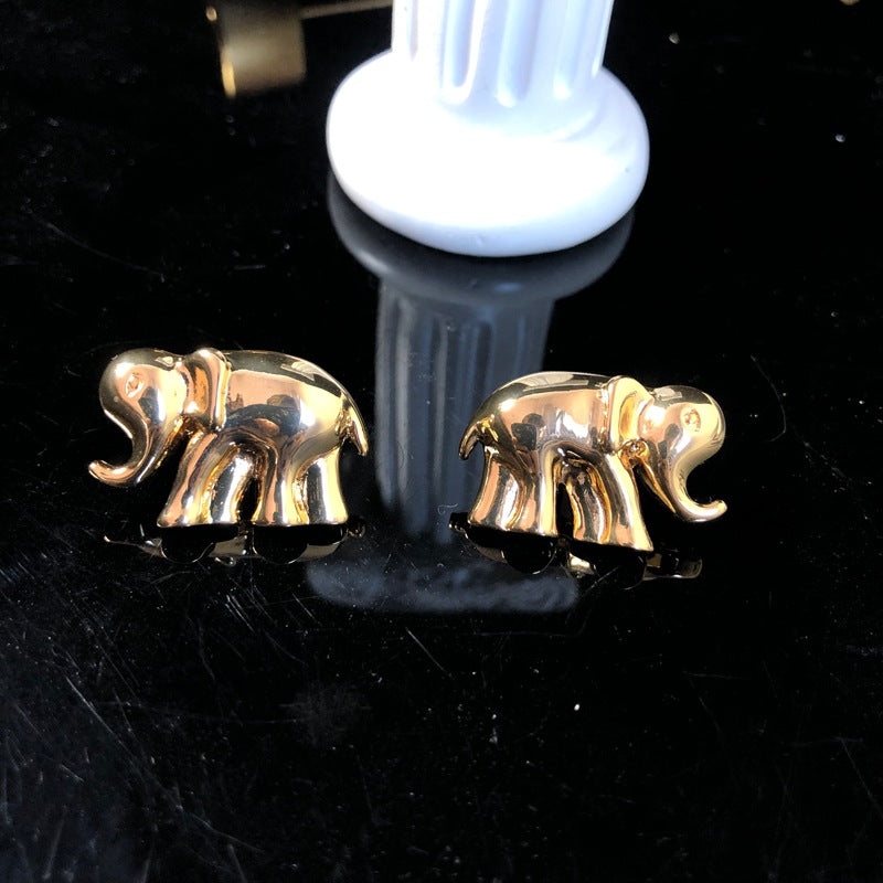 New stylish and versatile design, featuring a simple gold-tone aesthetic, and a fashionable elephant-themed necklace, bracelet, and earring set