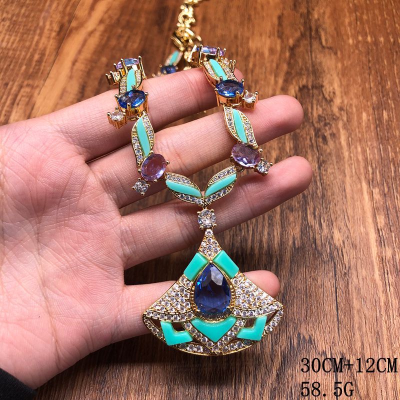 Cross-border new light blue fan necklace and earring set, gold-plated, heavy-duty, European and American style, elegant copper jewelry with zircon inlays